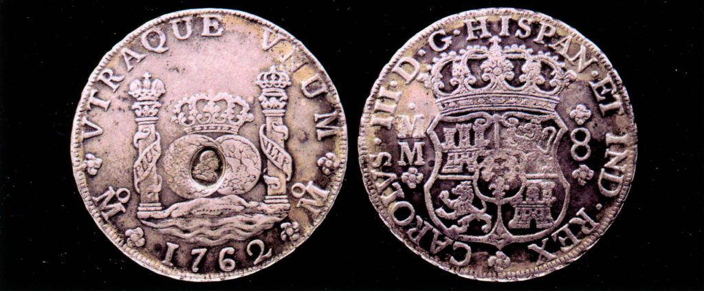 Монета достоинством в 8 реалов, отчеканенная при Карле III на монетном дворе Мехико в 1762 году