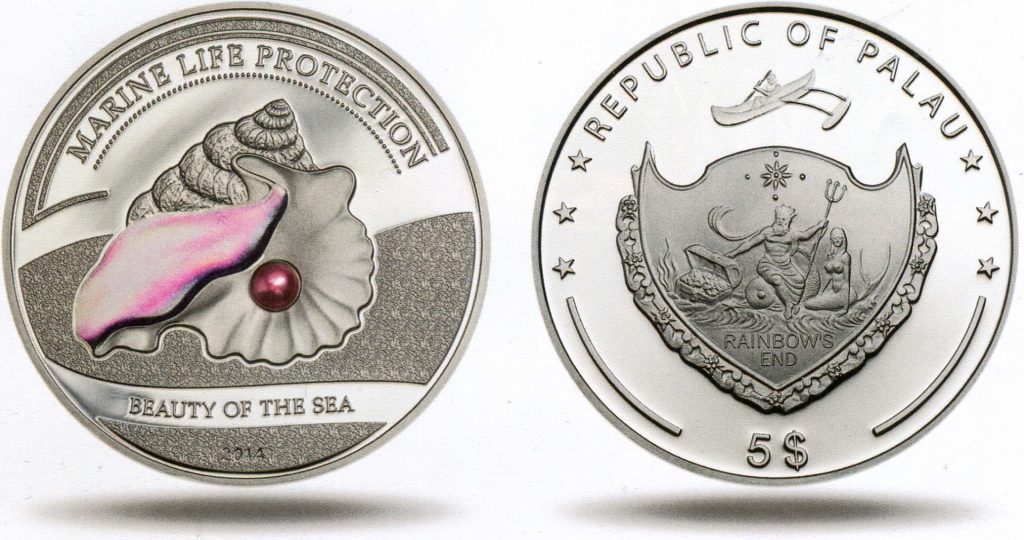 серебряная монета с розовой жемчужиной